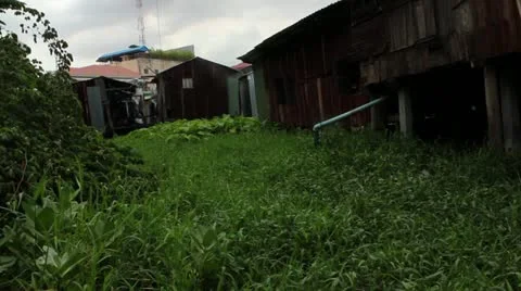 Behind Cambodian Shacks Stock Footage 20059334