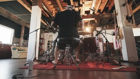 Behind Drummer in Recording Studio Move Left Stock Footage 89511572