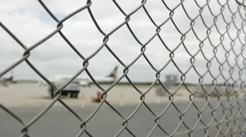 Behind the fence Stock Footage 12100685