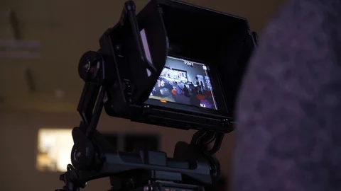 Behind the scene of tv movie video film shooting production crew team and camera Stock Footage 86408822