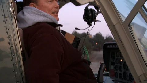 Behind the scenes (BTS) on a movie set in Detroit including Movie Helicopters Video stock 109205366