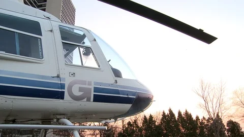 Behind the scenes (BTS) on a movie set in Detroit including Movie Helicopters Video stock 109205643