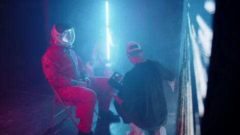 Behind the Scenes of Dp Giving Direction to Astronaut on Set Stock Footage 270334075
