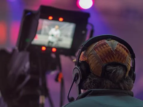 Behind the Scenes: Filmmaker Capturing Perfect Shot Stock Photos