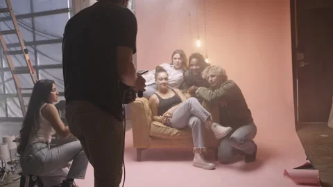 Behind the Scenes Footage of Camera Crew and Models on Set in a Studio Stock Footage 219572103