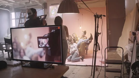 Behind the Scenes Footage of Camera Crew and Models on Set in a Studio Stock Footage 219593447