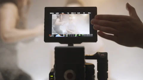 Behind the Scenes Footage of a Videographer Getting Footage of a Group Stock Footage 219570699
