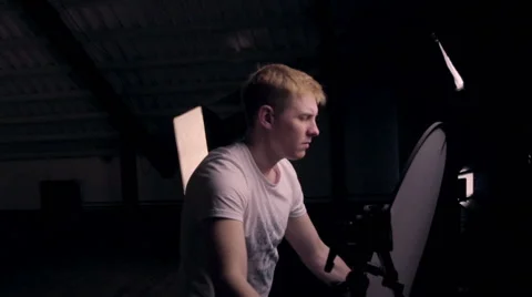 Behind the scenes. An operator film a scene of musical video with rock band on s Stock Footage 62113049