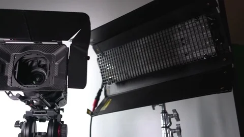 Behind the scenes production video. Videographer to work with slider. Light. 4k Stock Footage