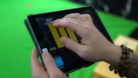 Behind the scenes shot of an iPad on a greenscreen set Video stock 128074516