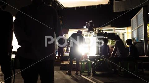 Behind the scenes of video production team silhouette Stock-Fotos