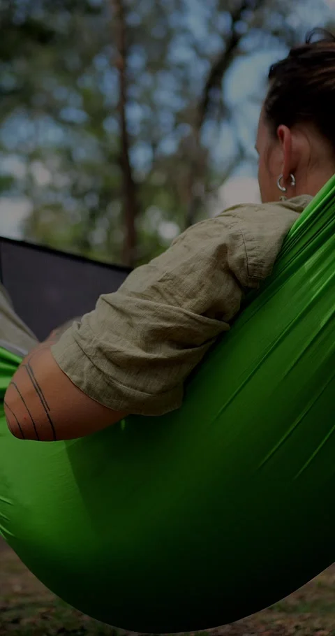 Behind-the-Shoulder View Of A Man Resting In A Green... Stock Footage 331820812