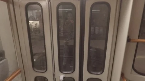 Behind the Tramcar Doors 库存影片 106906016
