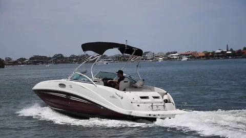 Behind view of a boat crusing on the water Video stock 81935508