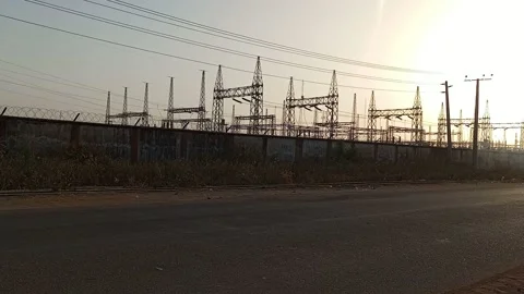 Behind The Wall View Of Power Transmission Plant At Sunset Stock Footage 321405302