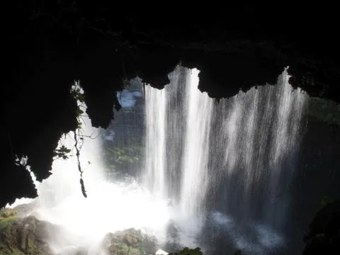 Behind the waterfall Stock Photos