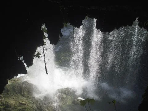 Behind the waterfall Stock Photos