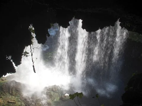 Behind the waterfall Stock Photos