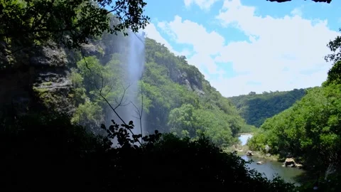 Behind the waterfall view at cascades in Mauritius Video stock 170032772
