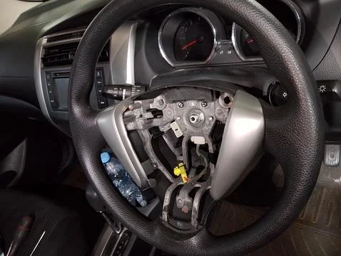 Behind the Wheel: A Disassembled Steering Column Stock Photos