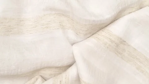 Beige and light brown polyester fabric texture with soft folds Stock Footage 315226383