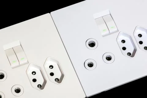 Beige and White Multiplug Sockets and switches Stock Photos