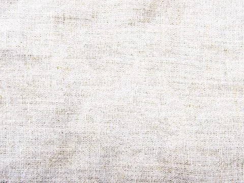 The beige background of the closeup bagging. Selective focus. Stock Photos