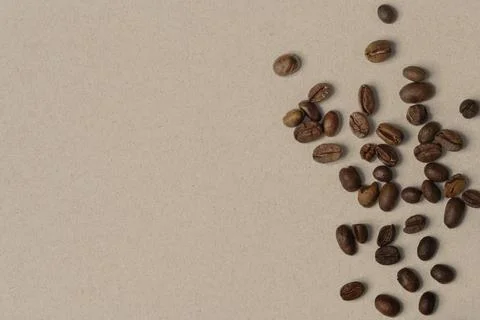 Beige background, coffee beans border Foto stock