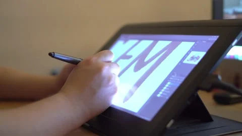 Beige background, illustrator drawing on the computer Stock Footage 143830959