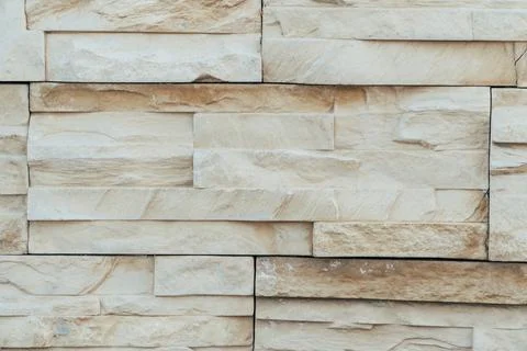 Beige background made of artificial stone 스톡 사진