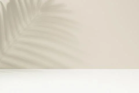 Beige background, minimal product backdrop, natural light and shadow design Stock Photos