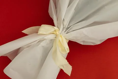 Beige bow on a bouquet Stock Photos