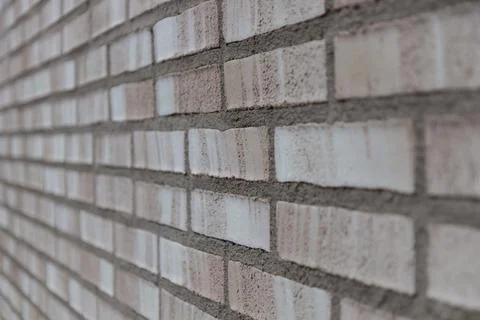 Beige Brick wall. background and texture Stock Photos