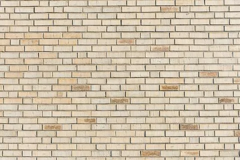Beige brick wall background Stock Photos