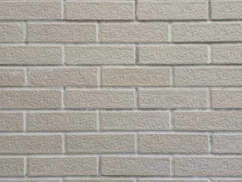Beige brick wall texture seamless background pattern Foto stock