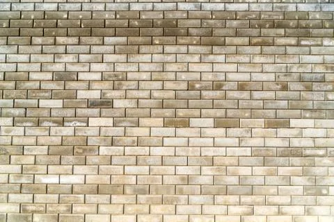 Beige bricks wall background Stock Photos