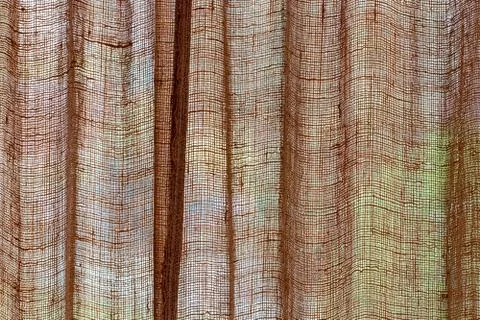 Beige canvas texture with delicate mesh pattern as abstract background Stock Photos
