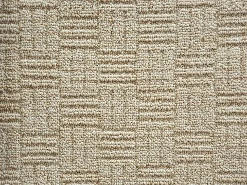 Beige carpet texture background, square shape pattern. Polypropylene carpet 库存照片