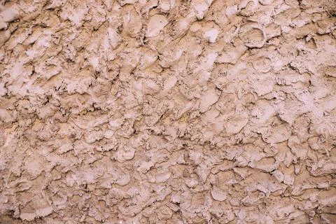 Beige cement texture wall background. Close up. Stock Photos