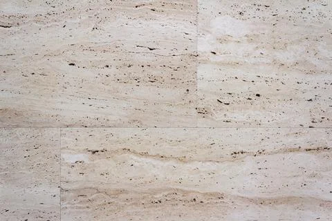 Beige colored stone wall texture. Stock Photos