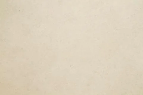 Beige colored tiled wall texture or background Stock Photos