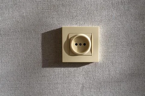 Beige electric wall socket with side shadow, european power outlet receptac.. Stock Photos