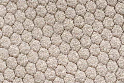 Beige fabric texture with hexagonal cells Foto stock