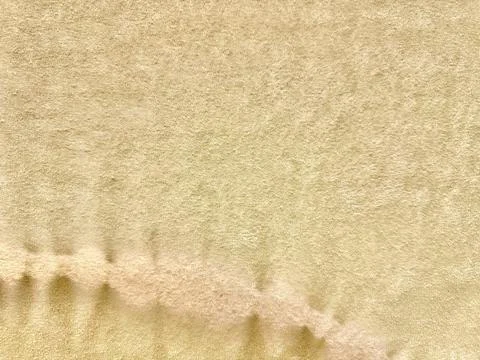 Beige fabric texture macro soft plush woven textile with subtle raised embo.. Stock Photos