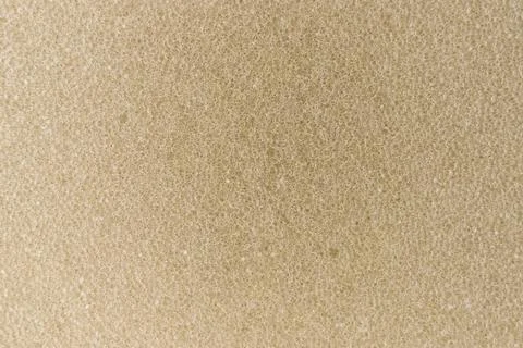 Beige Foam Texture Close-Up Background With Porous Sponge Surface And Soft .. Stock Photos