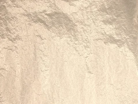 Beige foil with a subtle, abstract texture creates a smooth, sophisticated Stock Photos