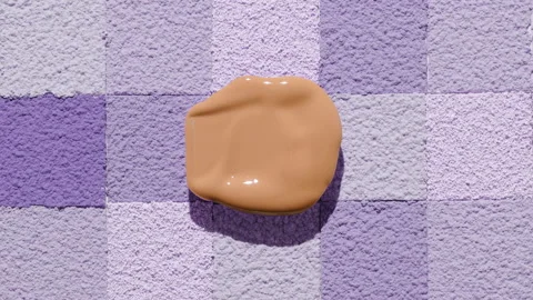 Beige foundation blob with shadow on purple mosaic Stock Footage 342564403