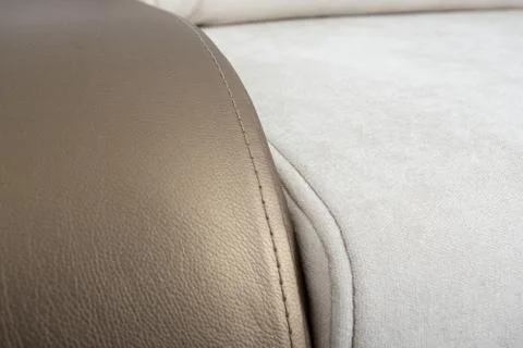 Beige gold corner leather texture close-up, couch Stock Photos