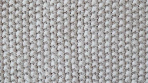 Beige Knitted Fabric Texture with Soft Cozy Pattern 写真素材