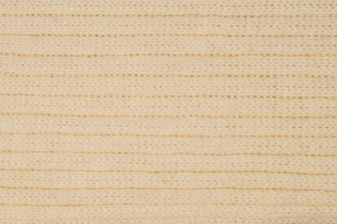 Beige knitted texture or background Stock Photos